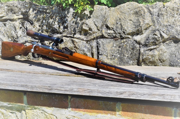 mauser gewehr 98 bolt-action rifle with side-mounted scope mauser gewehr 98 bolt-action rifle with side-mounted scope